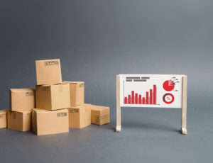 Industrial boxes and inventory Turns graphics deflect performance metrics.